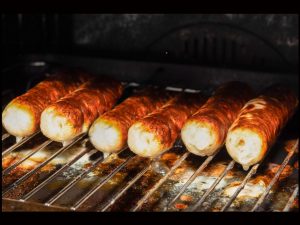 Getting a Grilling by Jim Gibson