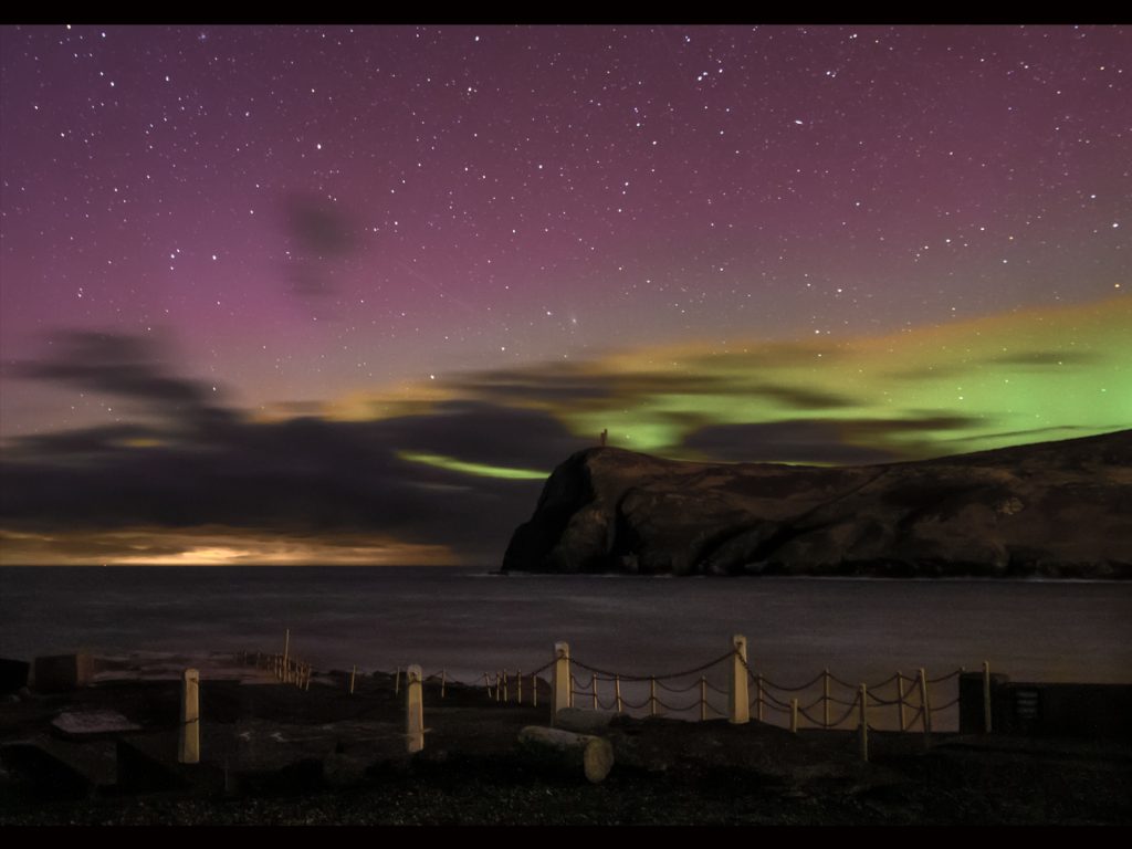 Cloudy Northern Lights by Jim Gibson